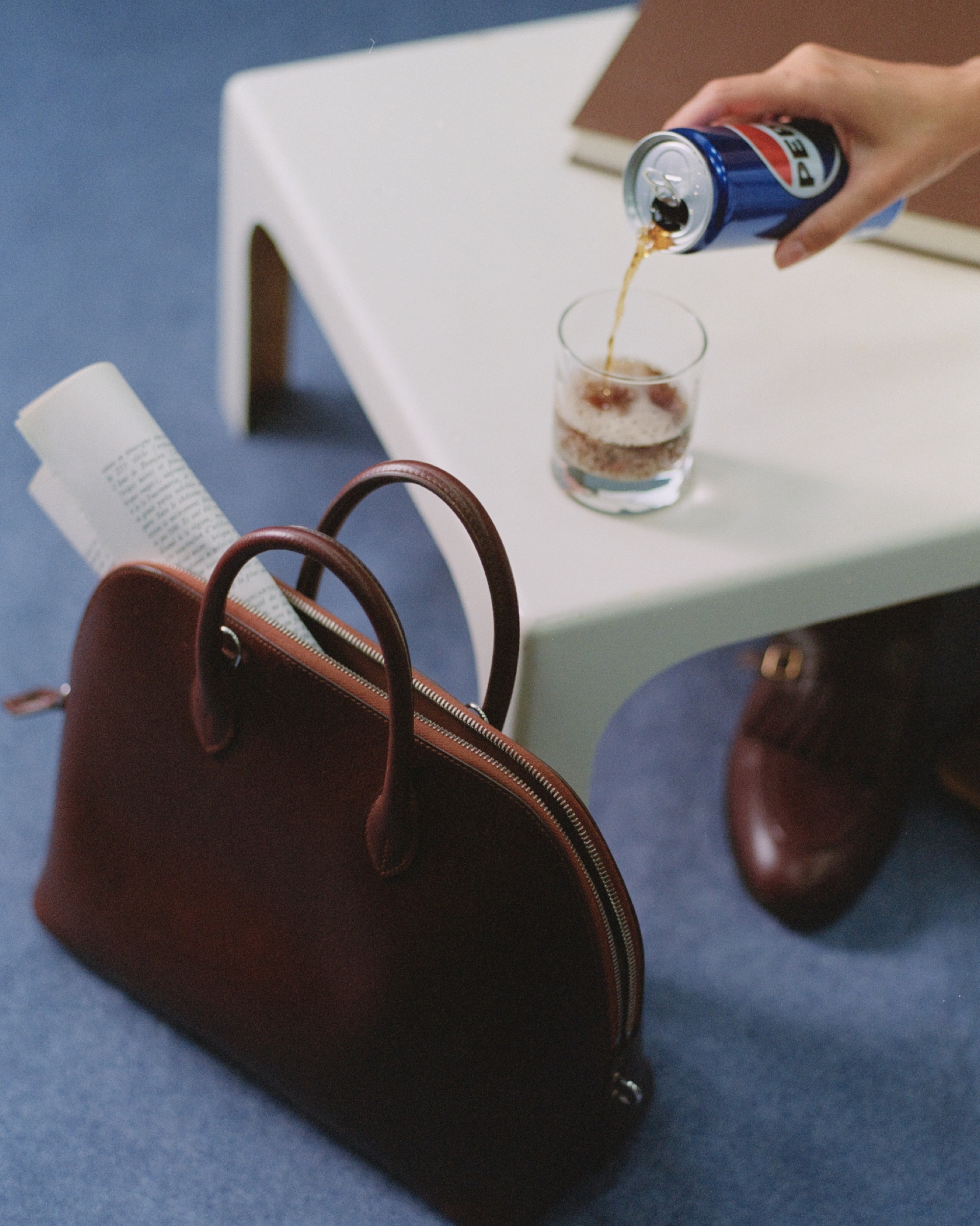 Fashion still-life editorial photographed by Valentin Abad for Vogue Greece. Image 12 of 14.